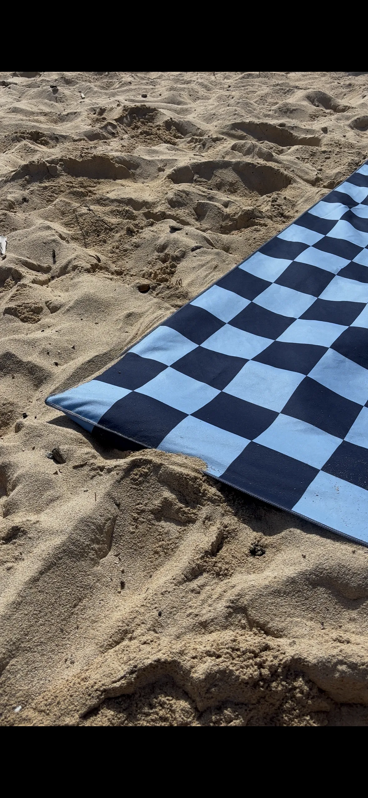 Windy Towel with sand-filled corner pockets